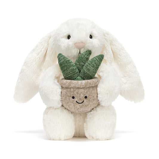 Jellycat bunny holding a plant