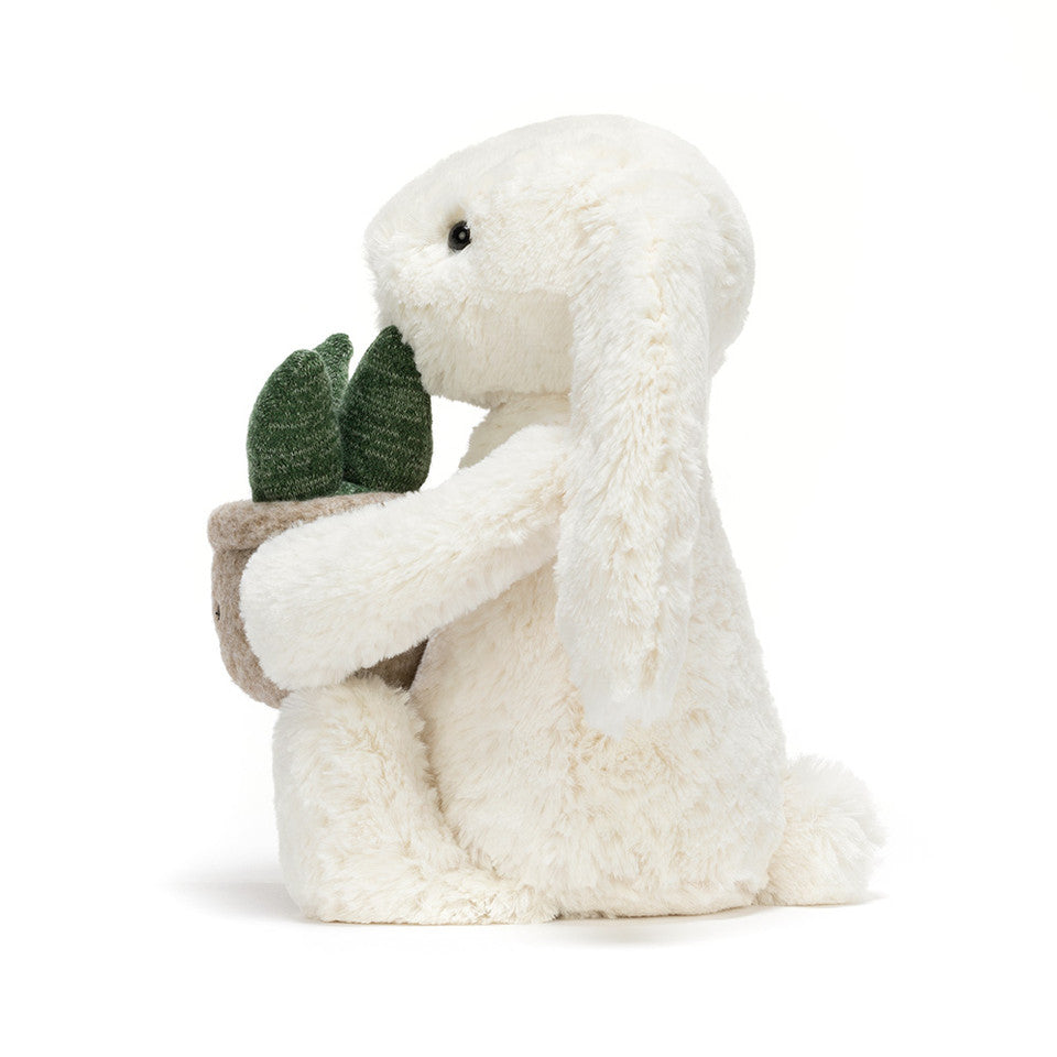 Jellycat bunny holding a plant