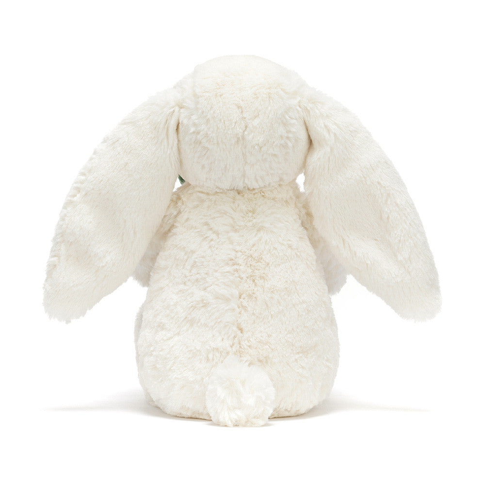 Jellycat bunny holding a plant
