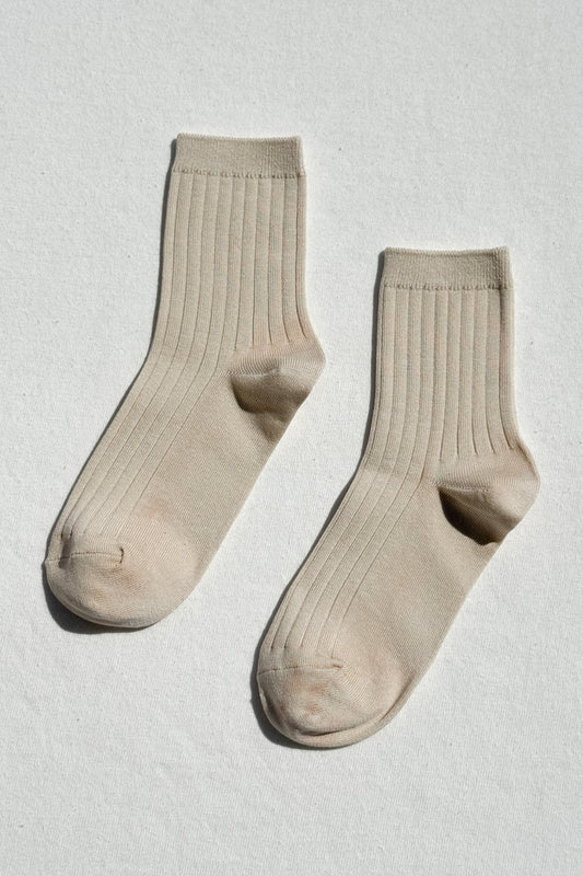 porcelain le bon shoppe socks her model flatlay on white background