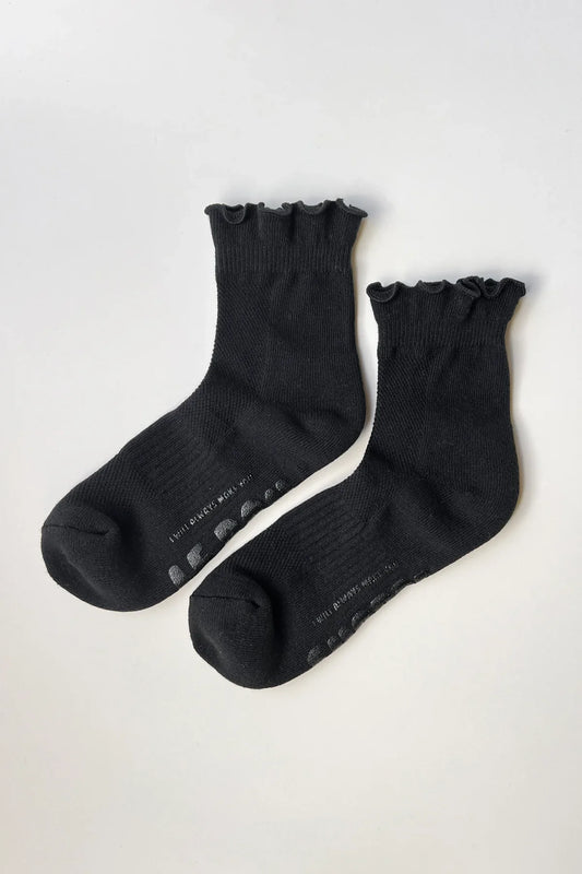 Pair of black socks on a white background