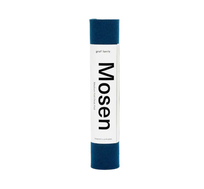 Mosen Navy Deskpad rolled in packaging