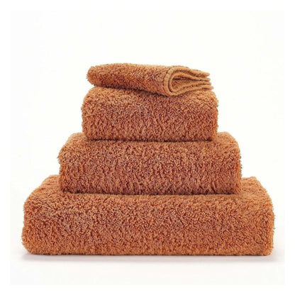 A pile of caramel-coloured towels