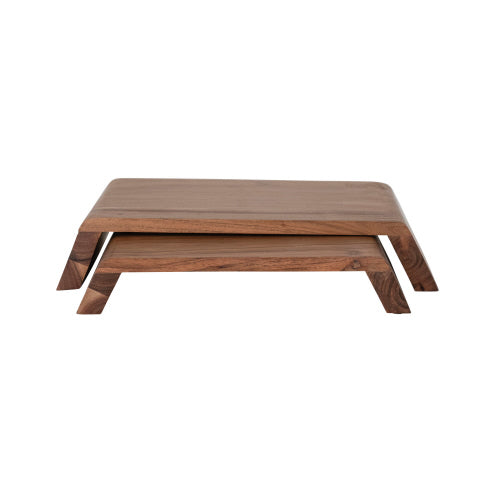 A rectangular acacia wood nesting pedestal in a natural finish.