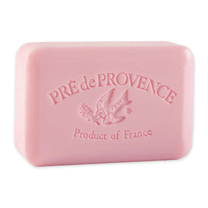Pink soap bar with 'Pre de Provence' branding on a white background