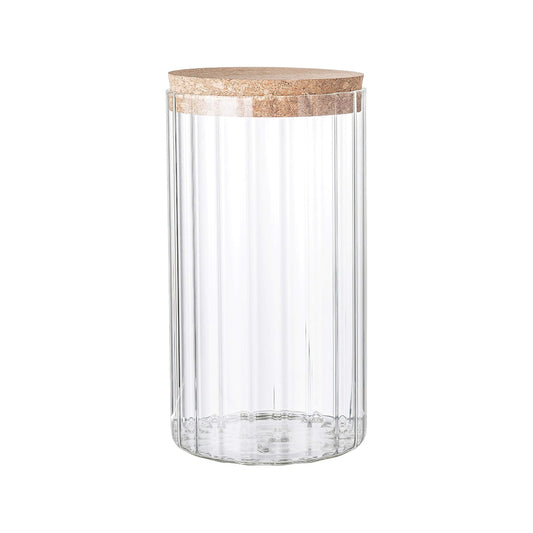 A clear glass jar with a ribbed design and a cork lid.