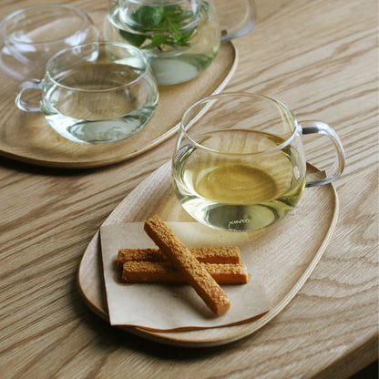 KINTO UNITEA Teacup and Willow Tray with tea and bread sticks