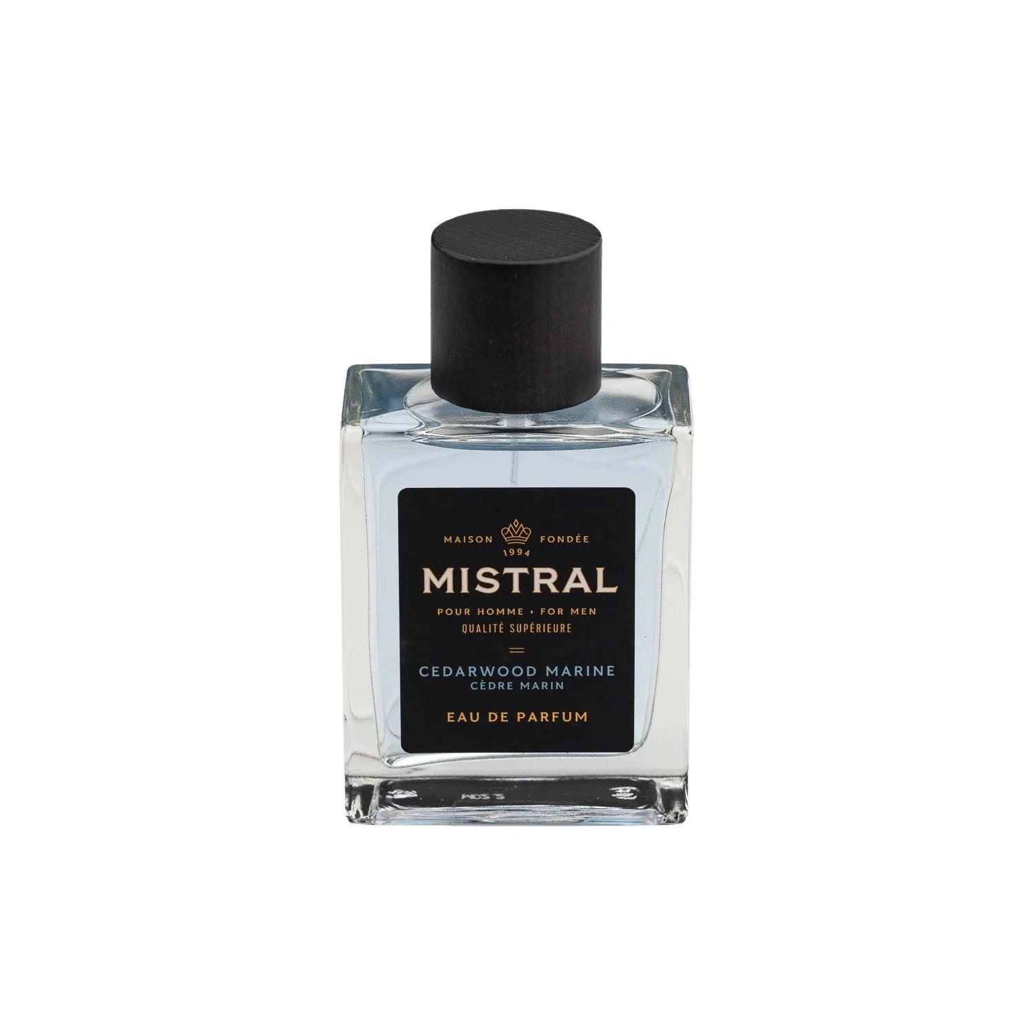 A bottle of Mistral Cedarwood Marine Eau de Parfum with a black cap and a label indicating it is a 100ml fragrance bottle.