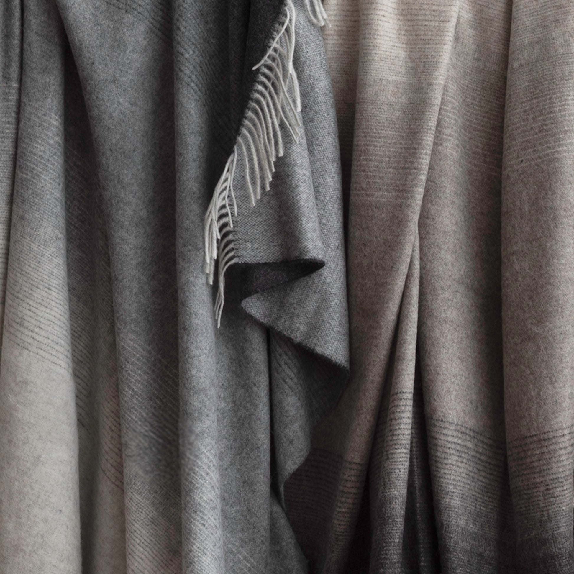 St Geneve Aria Throw Blankets in Charcoal and Crimini