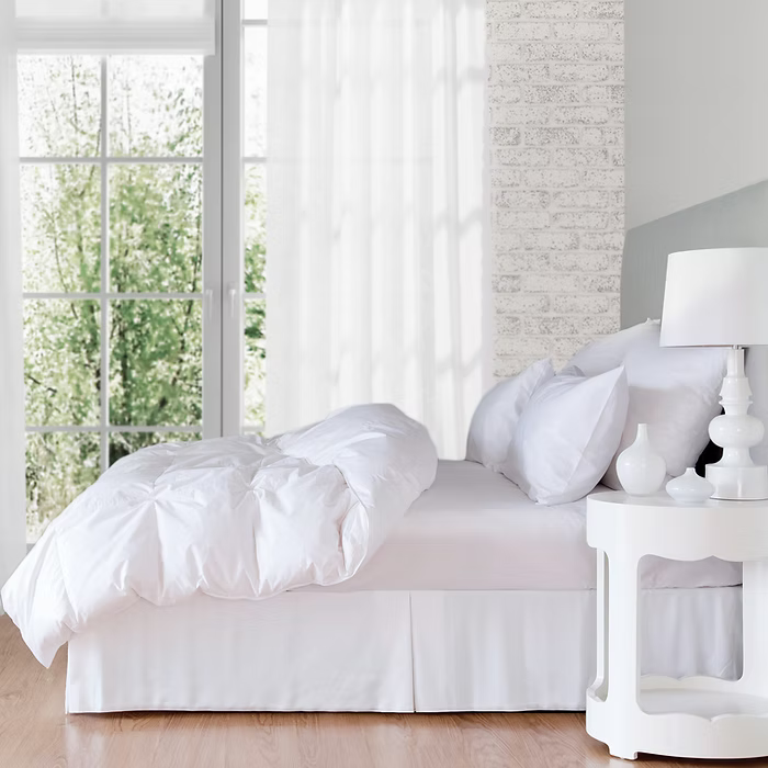 St Geneve Embassy Down Duvet displayed on bed.