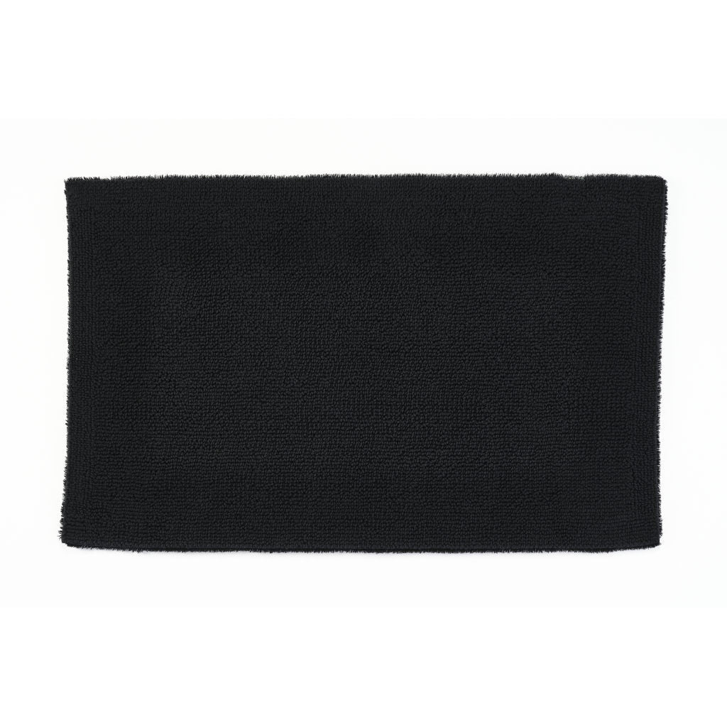 Black rectangular bath mat on a white background