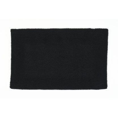 Black rectangular bath mat on a white background