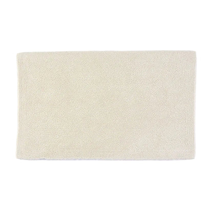 Beige bath mat on a white background