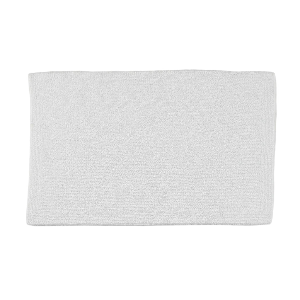 White bath mat on a white background