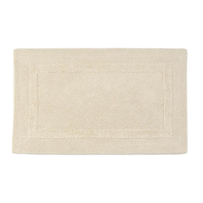 Beige bath mat on a white background