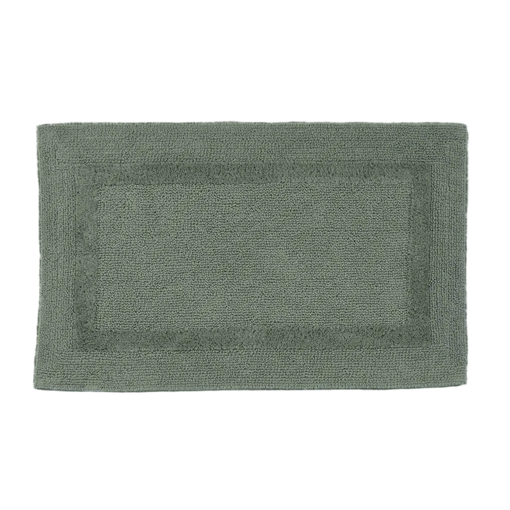 Green bath mat on a white background