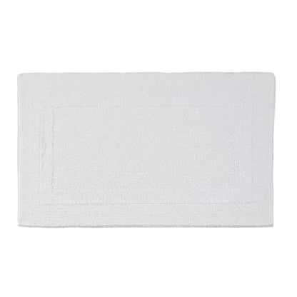 White bath mat on a light gray background