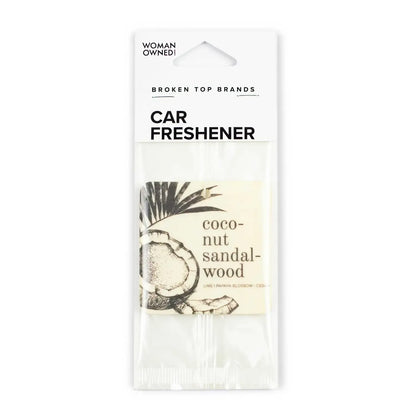 Car freshener packaging with coconut sandalwood scent on a white background