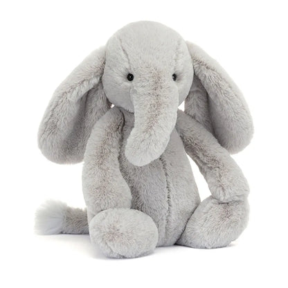 Plush toy elephant on a white background