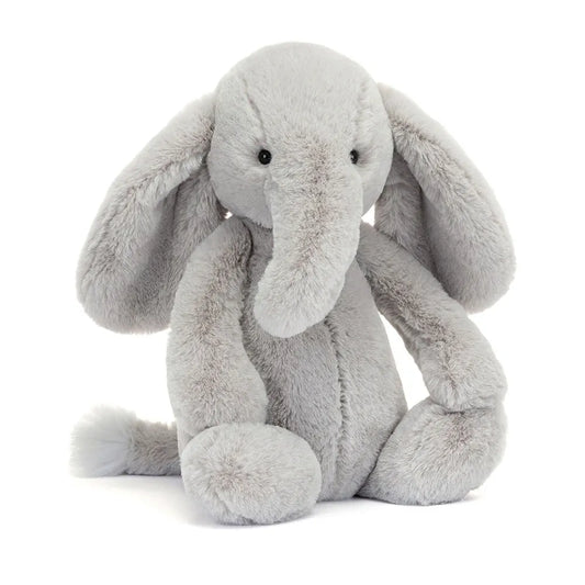 Plush toy elephant on a white background