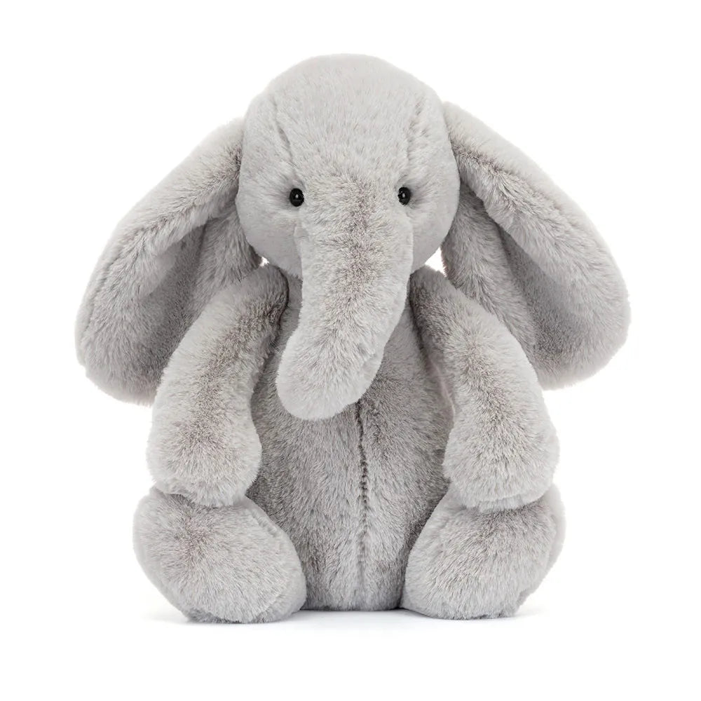 Plush elephant toy on a white background
