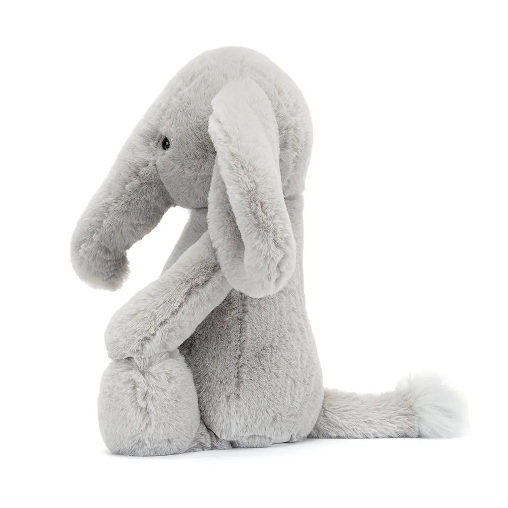 Plush elephant toy on a white background