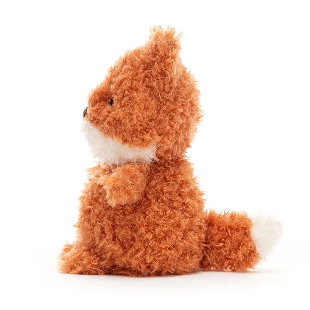 Plush toy fox on a white background