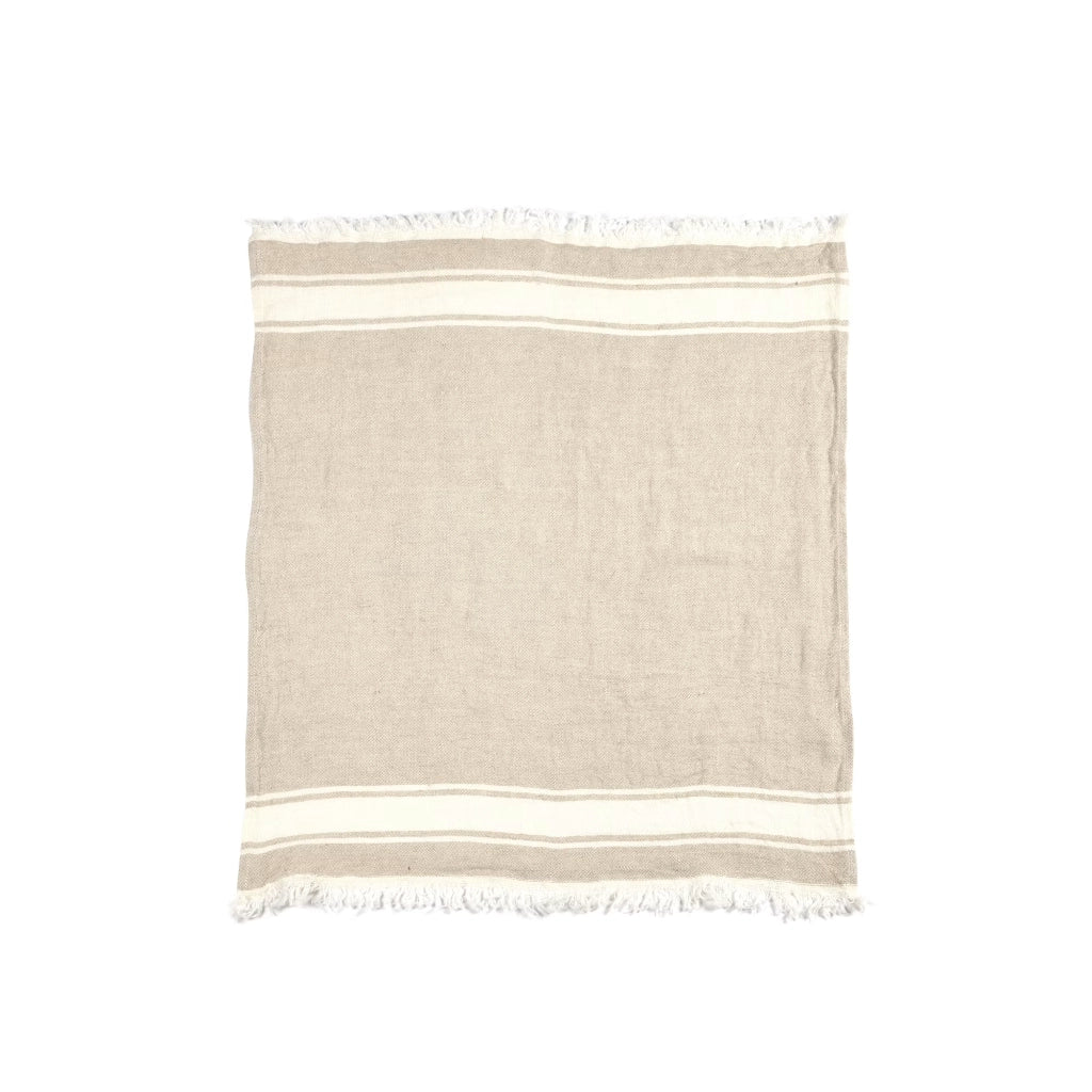 Beige towel with white stripes on a white background