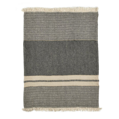 Gray and beige striped rug with fringes on a white background