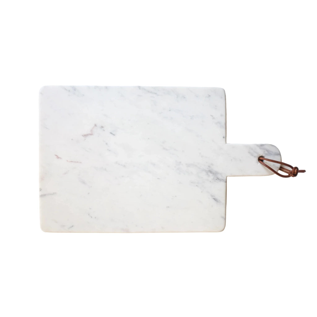 Marble cutting board with a handle on a white background