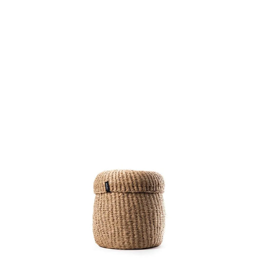 A small cylindrical woven basket with a fitted lid, made from natural tan seagrass or wicker, shown on a plain white background.
