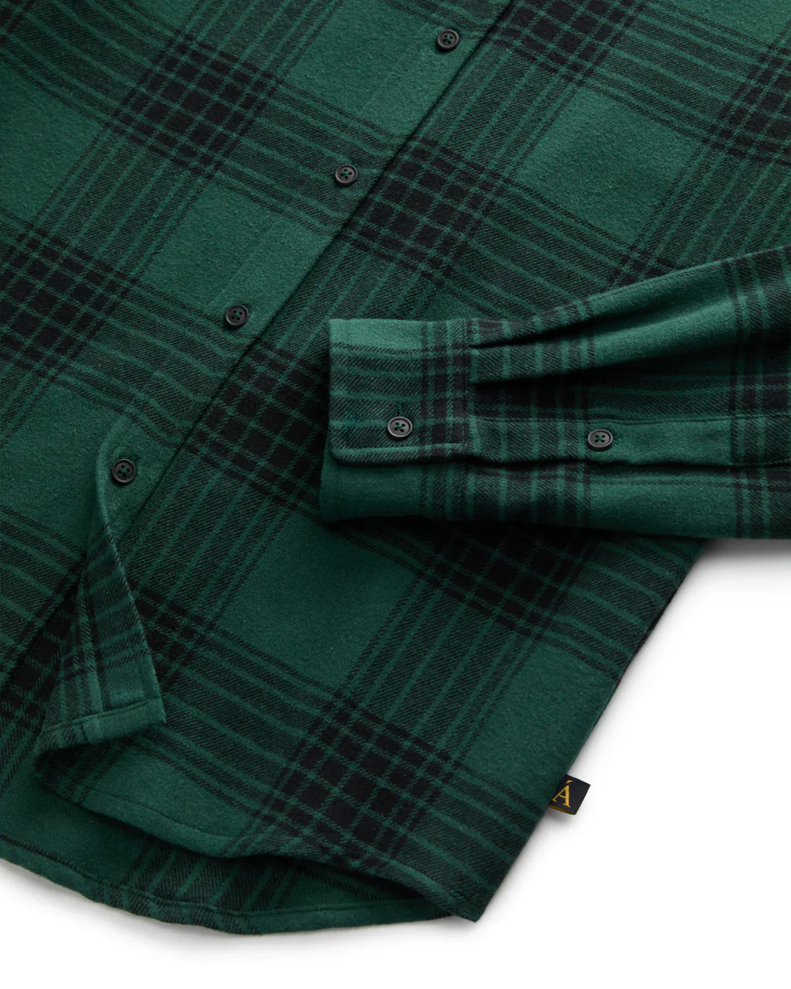 Anián men's unisex plaid flannel shirt in green with black detailing and button closures in Kelowna