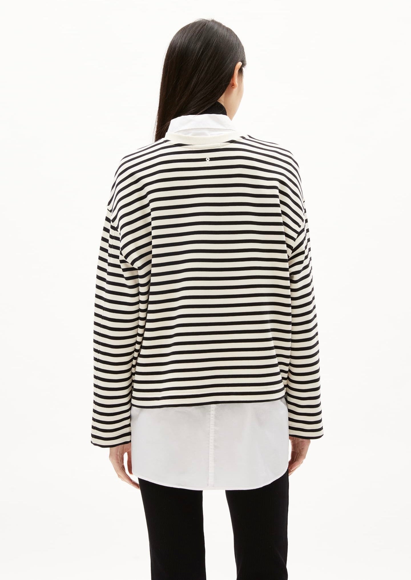ARMEDANGELS Canada black and white striped long sleeve shirt layered over white button-up top in Kelowna