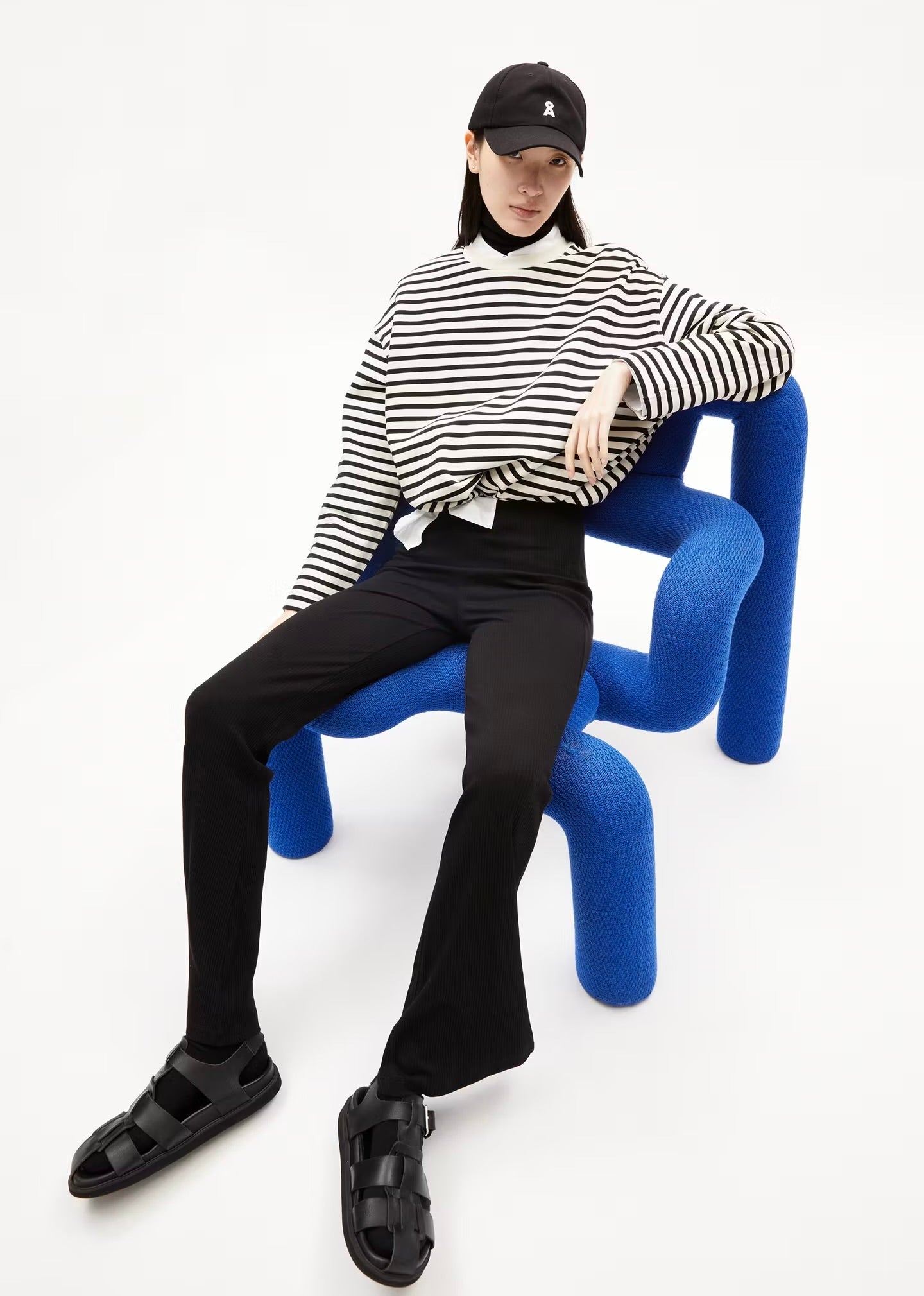 ARMEDANGELS Canada striped long sleeve sweatshirt styled with black pants and black sandals in Kelowna