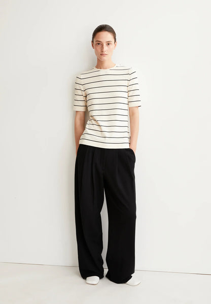 ARMEDANGELS Canada striped t-shirt featuring a classic crew neckline and short sleeves, styled with black pants in Canada