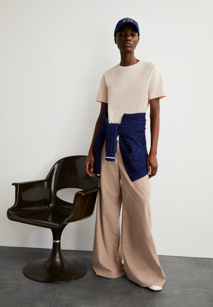 ARMEDANGELS Canada Beige T-Shirt Styled with Wide-Leg Pants and a Navy Sweater for a Casual Look in Canada