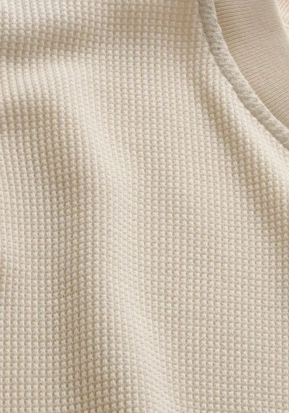 Close-up of beige fabric texture