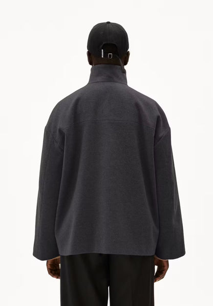 Back view of a woman wearing ARMEDANGELS Canada Majelaa cropped wool coat in steel melange grey on a white background.