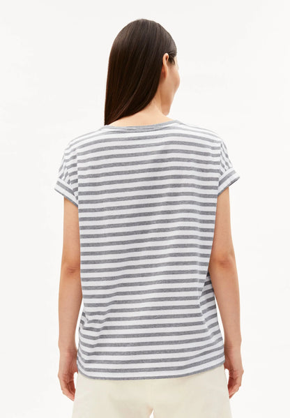 Person wearing a striped t-shirt on a white background