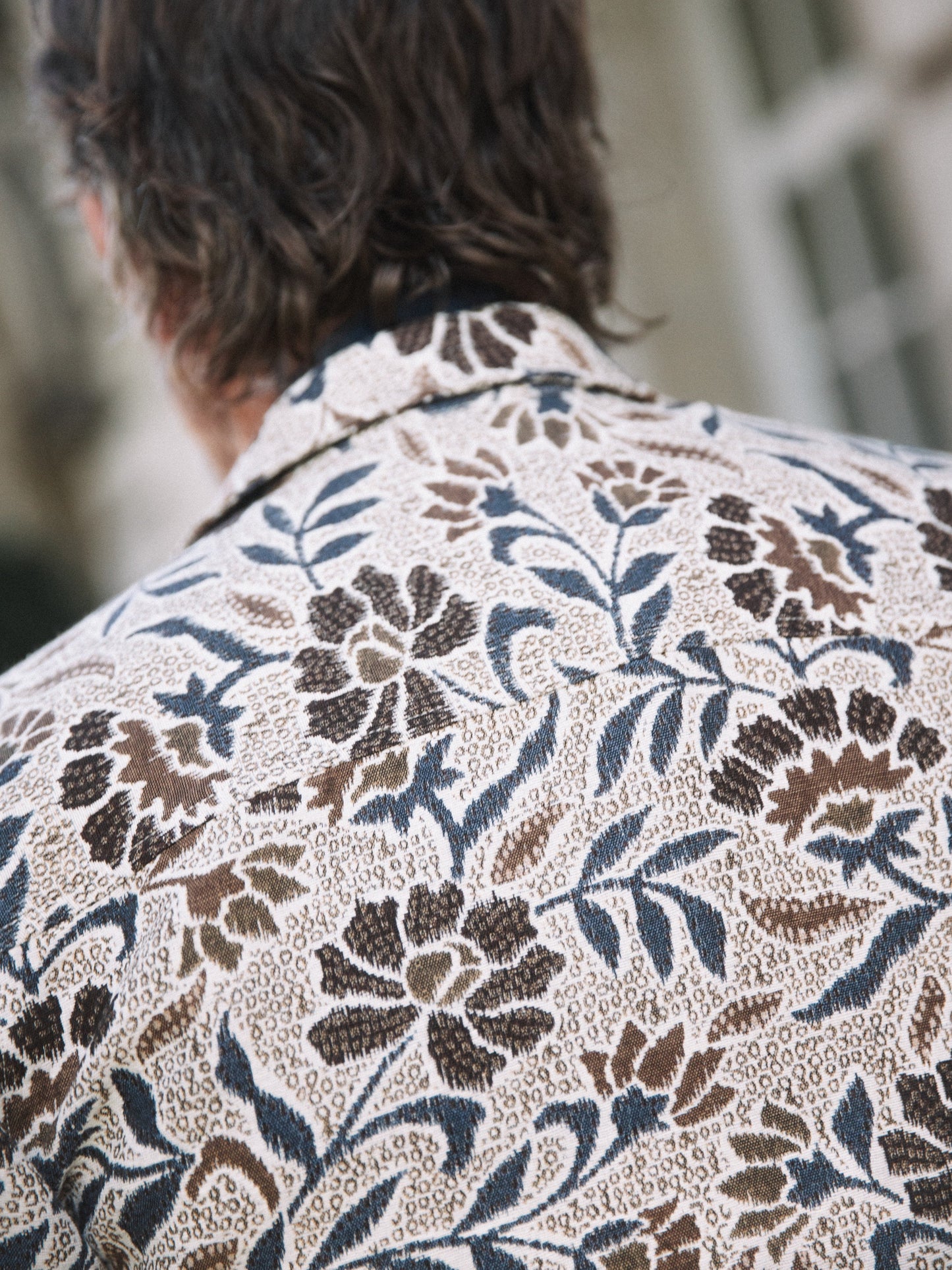 organic men's overshirt Mos Mosh Gallery beige floral print with blue and brown leaves back view in Kelowna