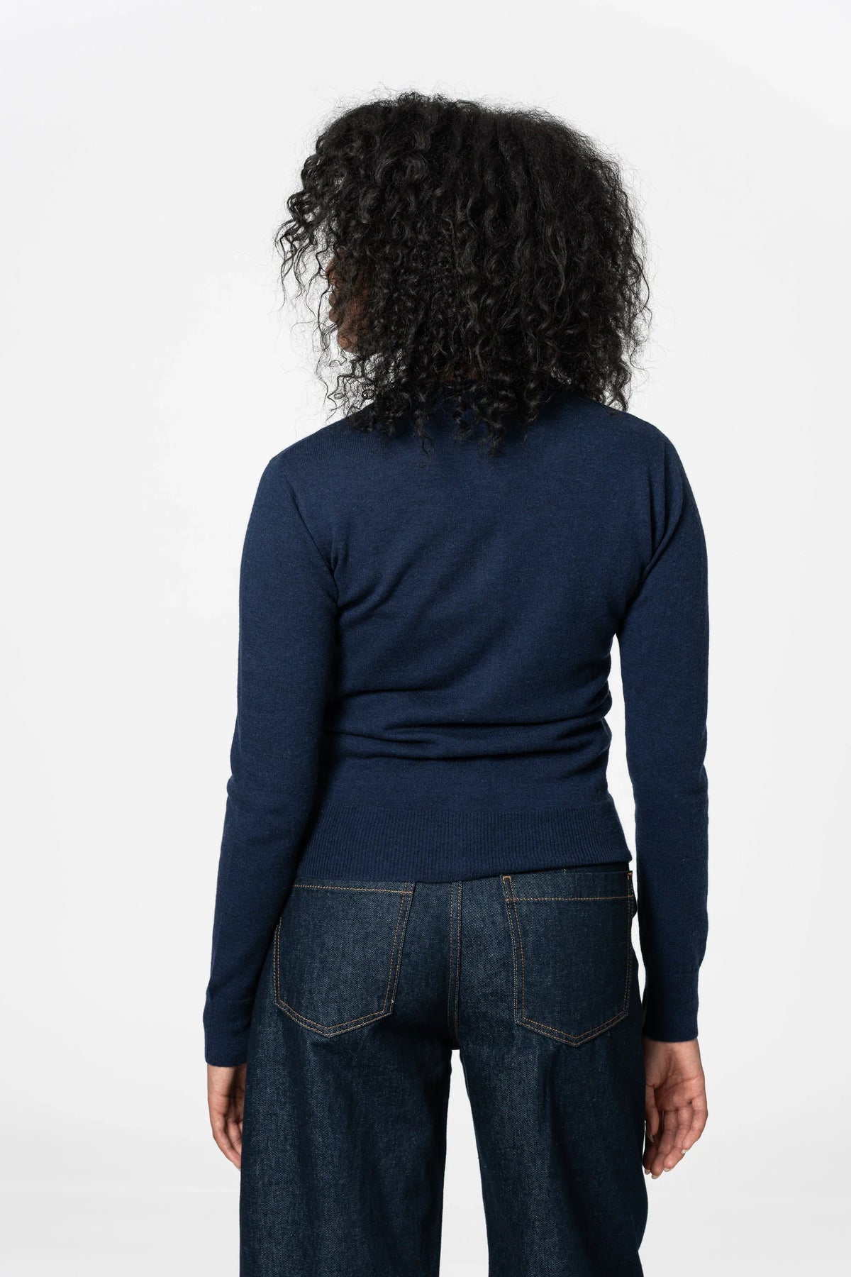 Back view of a Dinadi merino wool cardigan in navy, perfect for everyday casual wear in Kelowna
