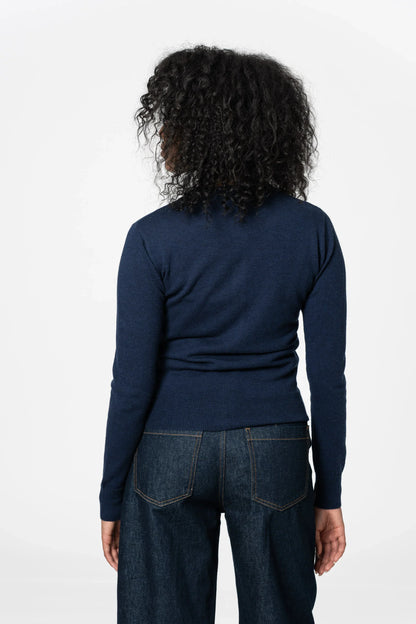 Back view of a Dinadi merino wool cardigan in navy, perfect for everyday casual wear in Kelowna