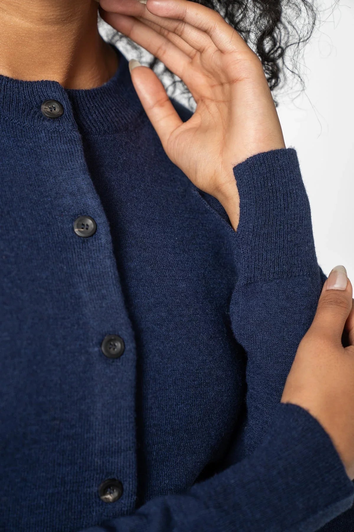 Dinadi navy merino wool cardigan with button closures and soft texture for comfort in Kelowna