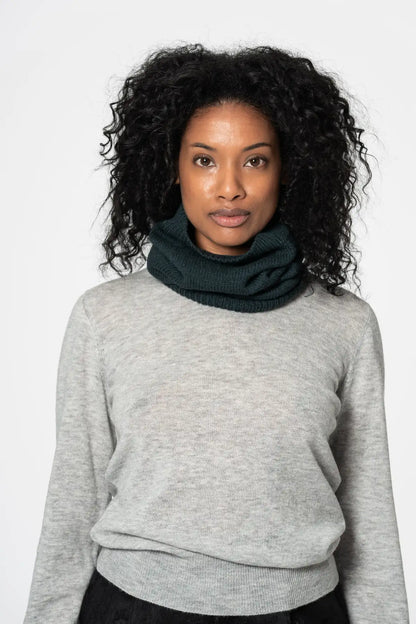 Dinadi cozy merino wool neckwarmer in dark green, perfect for adding warmth and style to winter outfits in Kelowna