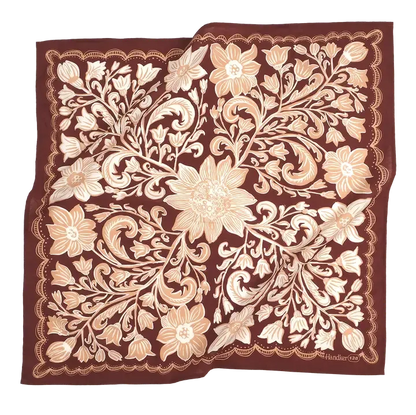 A square silk scarf featuring an ornate floral and scroll pattern in cream and beige on a deep burgundy background, with a small 'Hudson City' brand signature in the bottom right corner.