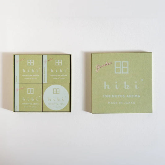 Two green boxes of 'hibi' Iominutes Aroma on a white background