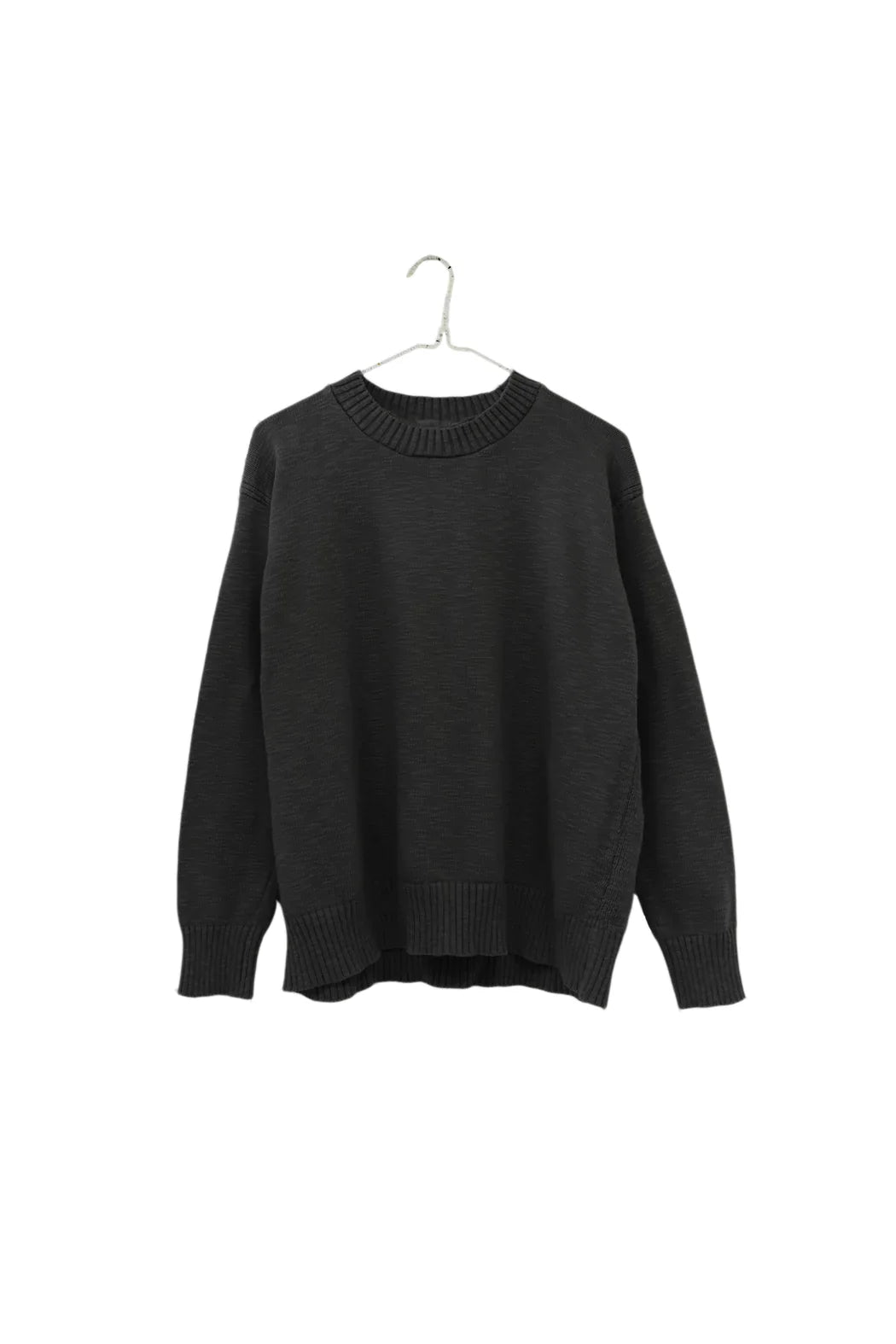A dark charcoal gray knit sweater hanging on a hanger against a plain white background.