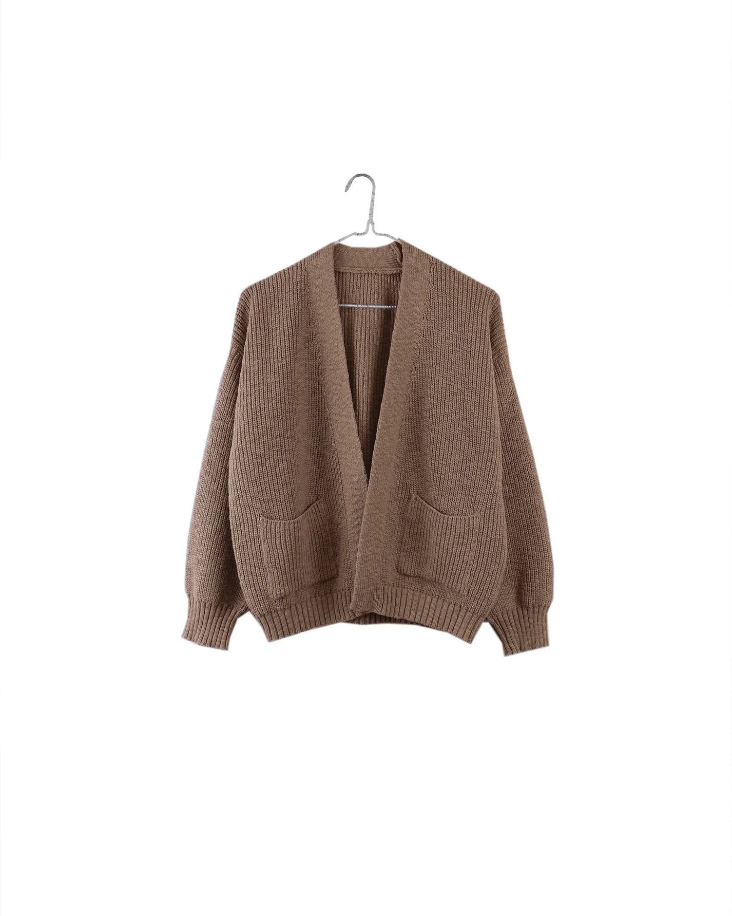 A brown ribbed knit cardigan sweater with front patch pockets, hanging on a metal hanger against a plain white background.