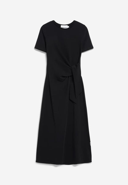 FULL FLAT LAY BLACK SHEATH WRAP DRESS AGAINST WHITE BACKGROUND
