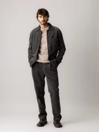 Man wearing MOS MOSH Gallery Canada Conor Corduroy Pant in Castlerock with a matching corduroy overshirt and cream knit, full-length front view against a light grey background.
front-2: Front view of MOS MOSH Gal